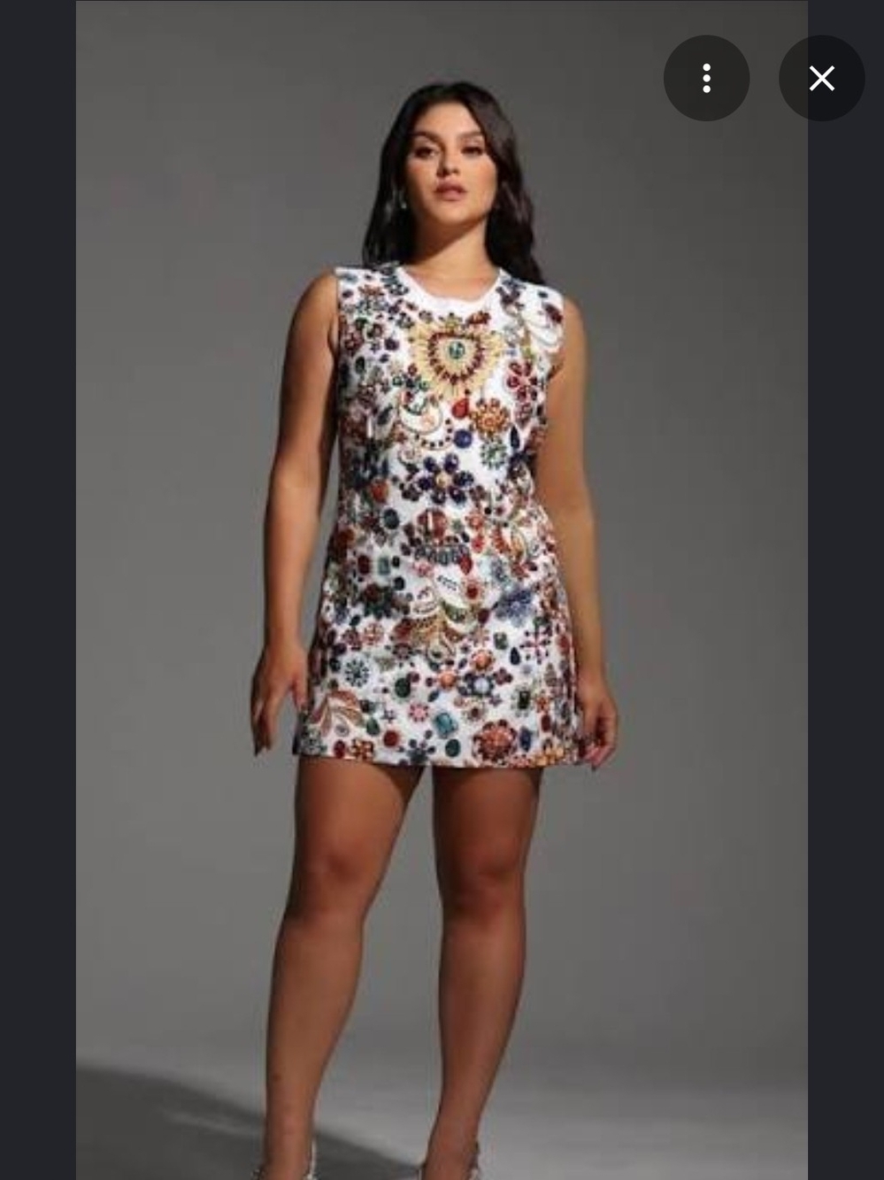 Mini Dress with white base covered in vibrant multi-colored jewel embellishments